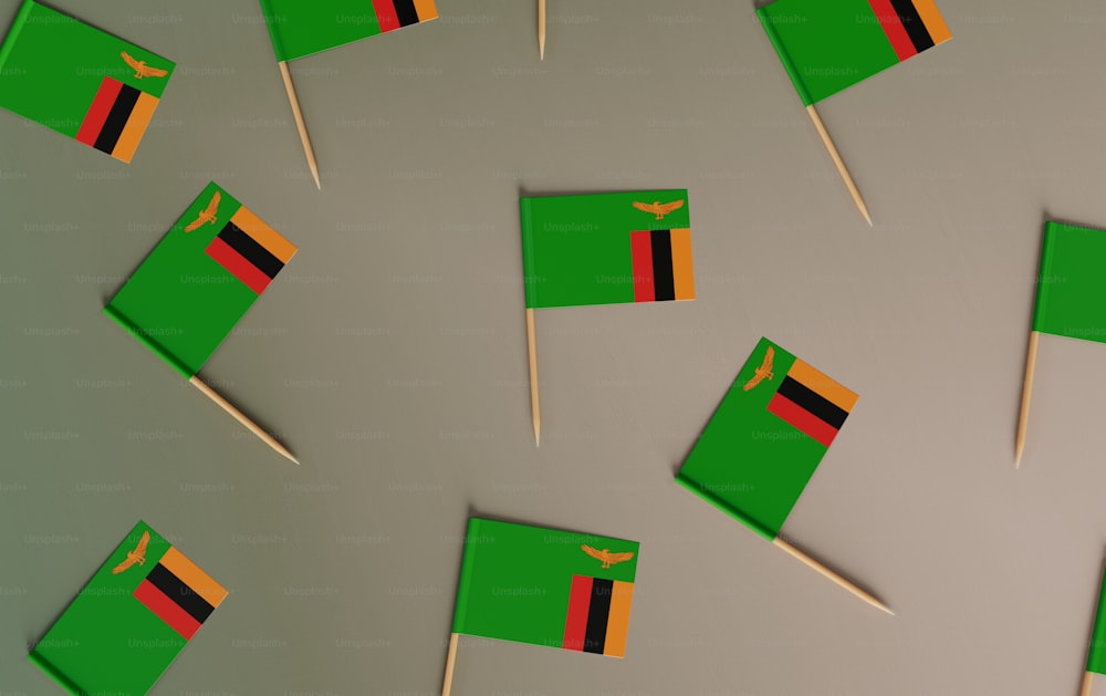 a bunch of flags that are on a table