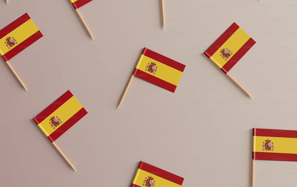 a group of small flags sitting on top of a table