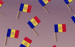 a bunch of flags that are on a stick