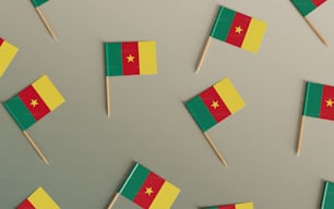 Un gruppo di bandiere che si trovano su un bastone