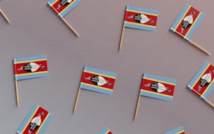 a group of small flags sitting on top of a table