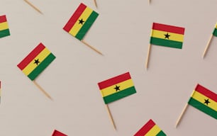 a bunch of small flags on a stick