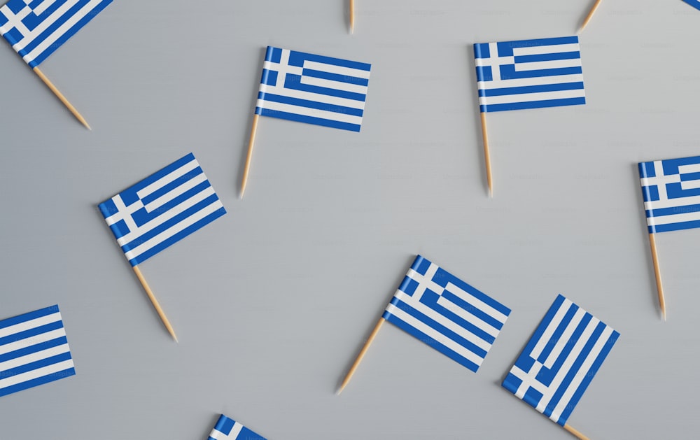 a group of toothpicks with flags on them