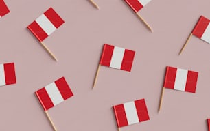 a group of small red and white flags