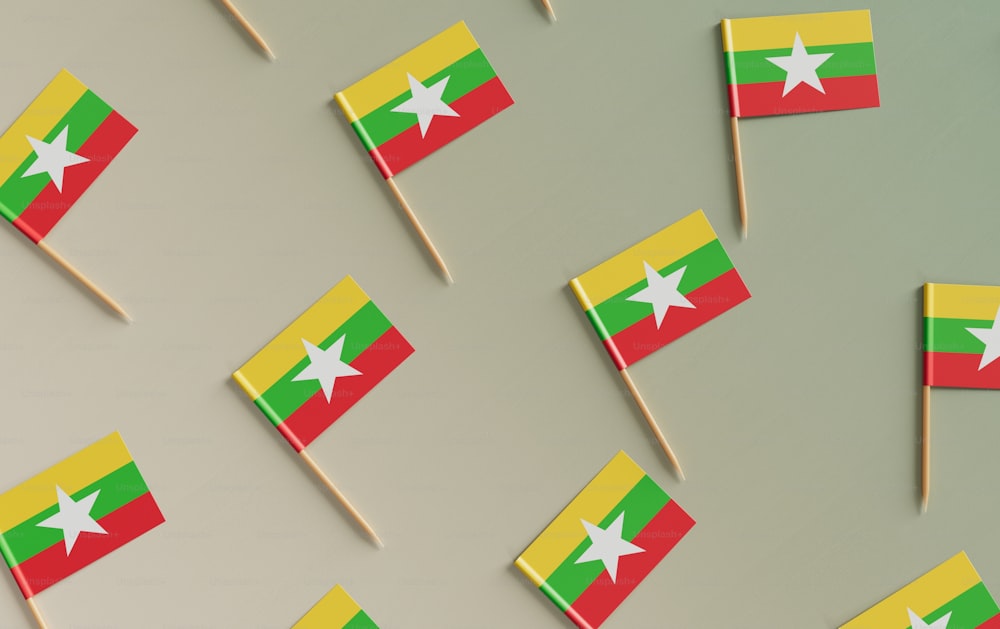 a group of small flags sitting on top of a table