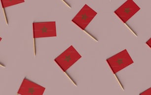 a group of red flags with stars on them