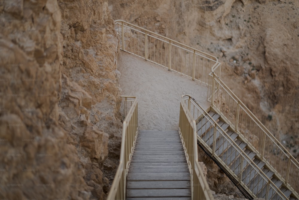 a set of stairs leading up to the top of a cliff
