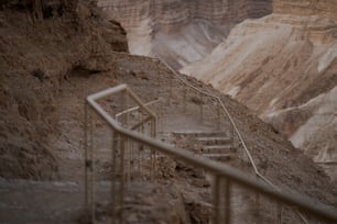 a set of stairs leading up to a cliff