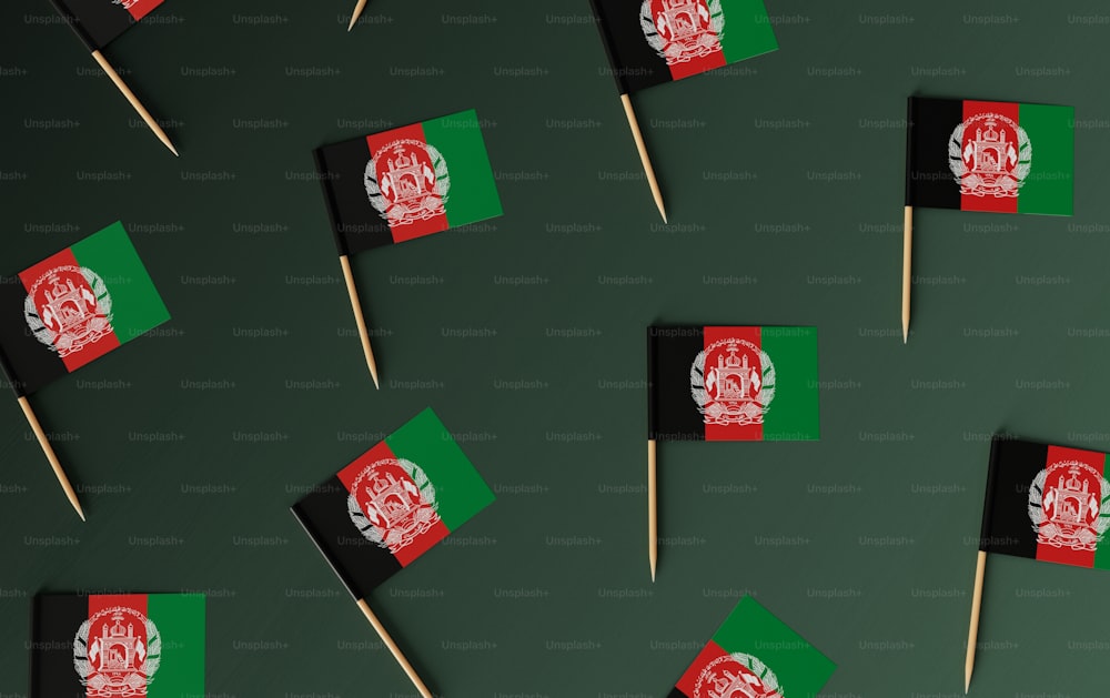 a group of toothpicks with flags on them