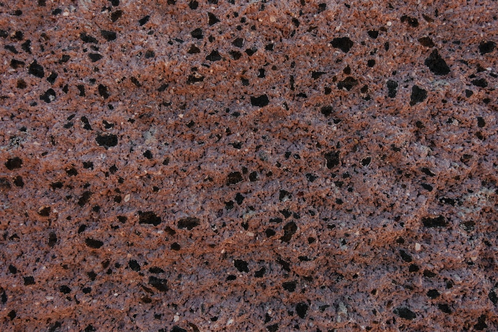 茶色の花崗岩の表面のクローズアップ