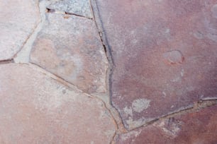 a close up of a rock with cracks in it