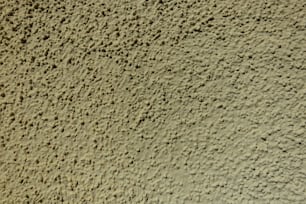 Un primer plano de una pared hecha de cemento