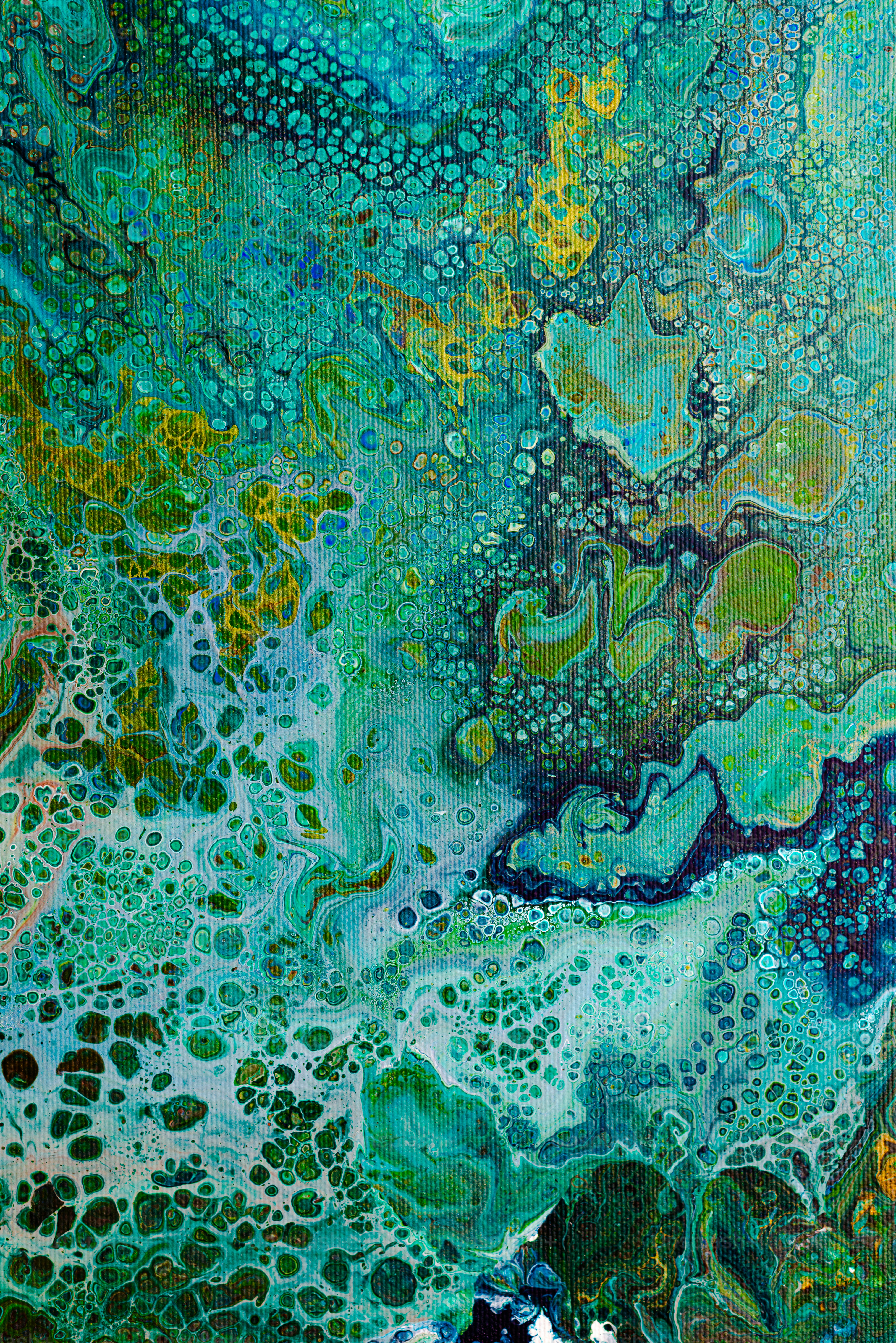 an abstract painting of blue, green and yellow colors