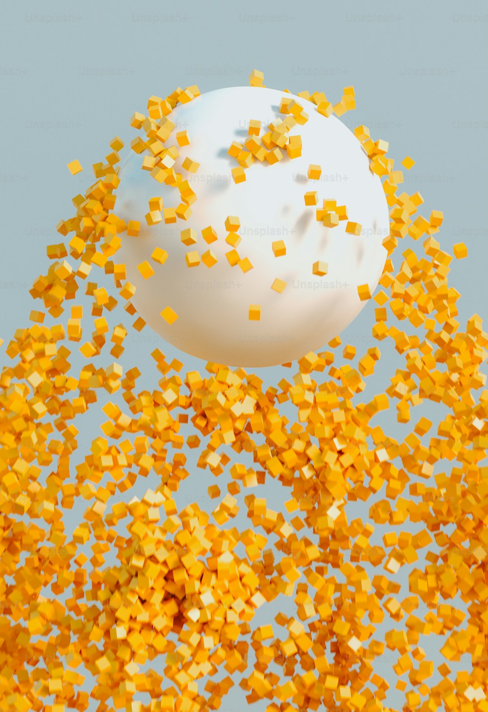 a bunch of yellow sprinkles floating in the air