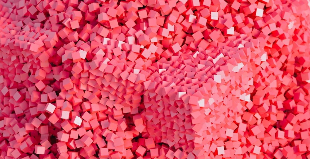 a large pile of pink hearts on a white background