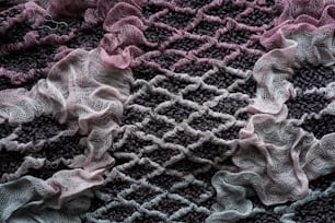 un primo piano di una coperta a maglia
