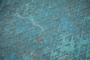 a close up of a metal surface with rust