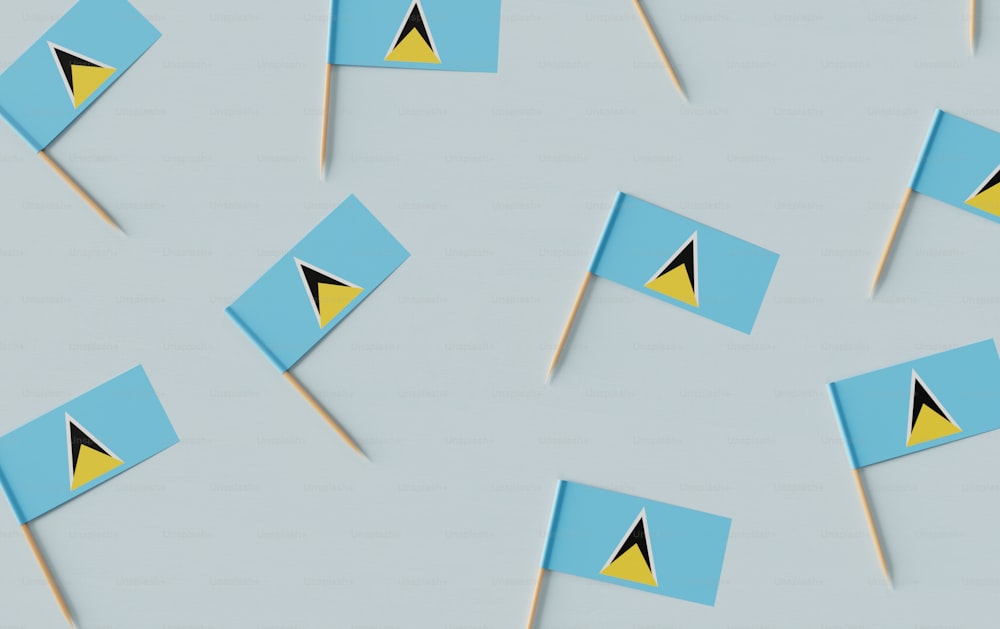 eine Gruppe blauer und gelber Flaggen auf einem Stock
