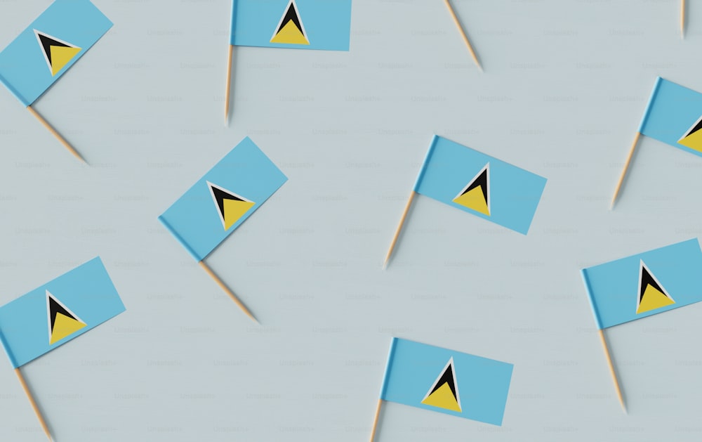 un gruppo di bandiere blu e gialle su un bastone