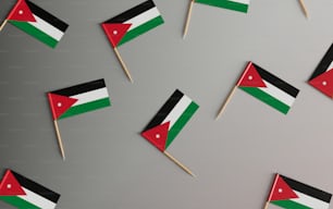 a group of flags that are on a stick