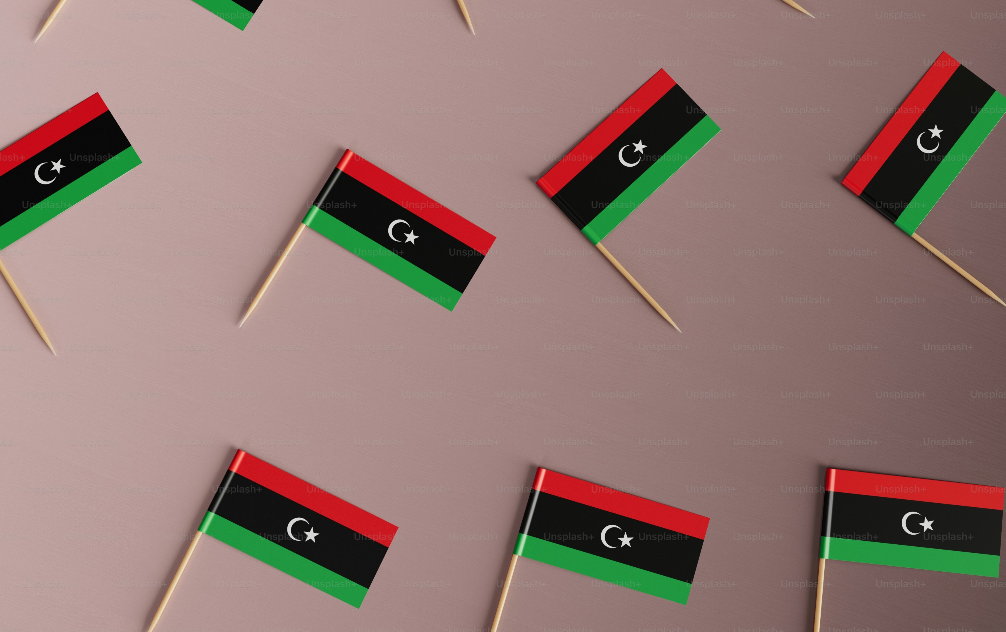 a group of small flags sitting on top of a table