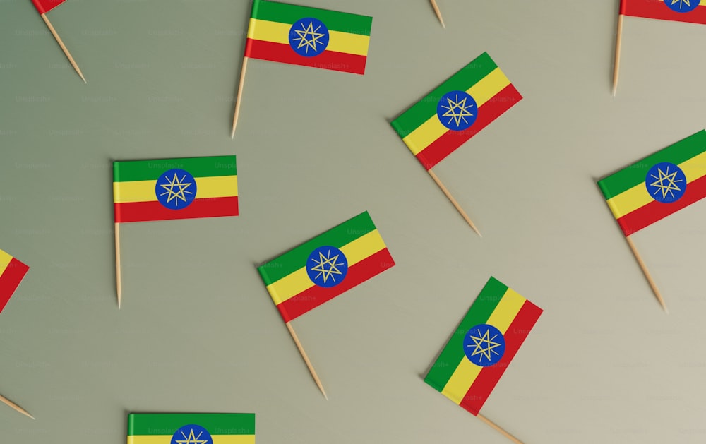 a group of small flags sitting on top of toothpicks