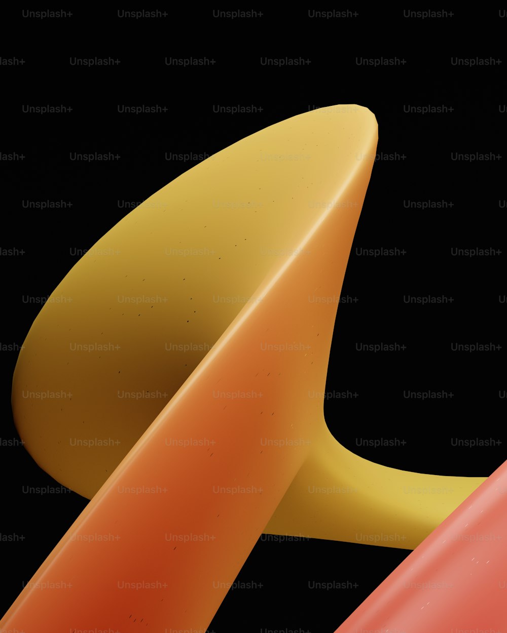 a close up of a pair of surfboards against a black background