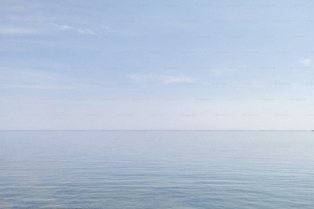 a boat floating on top of a large body of water