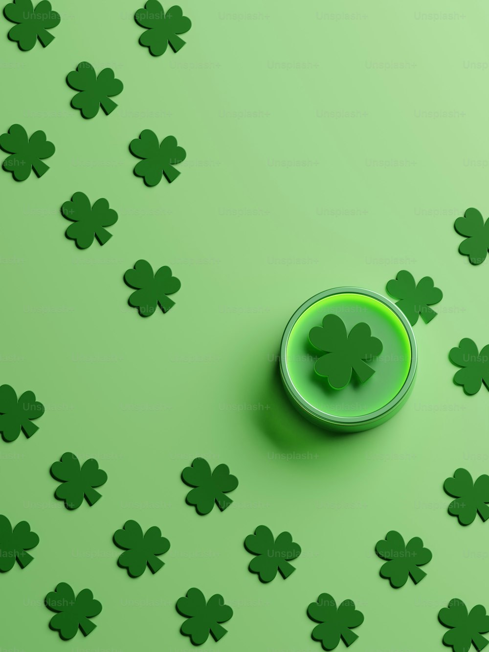 a green button surrounded by green shamrocks