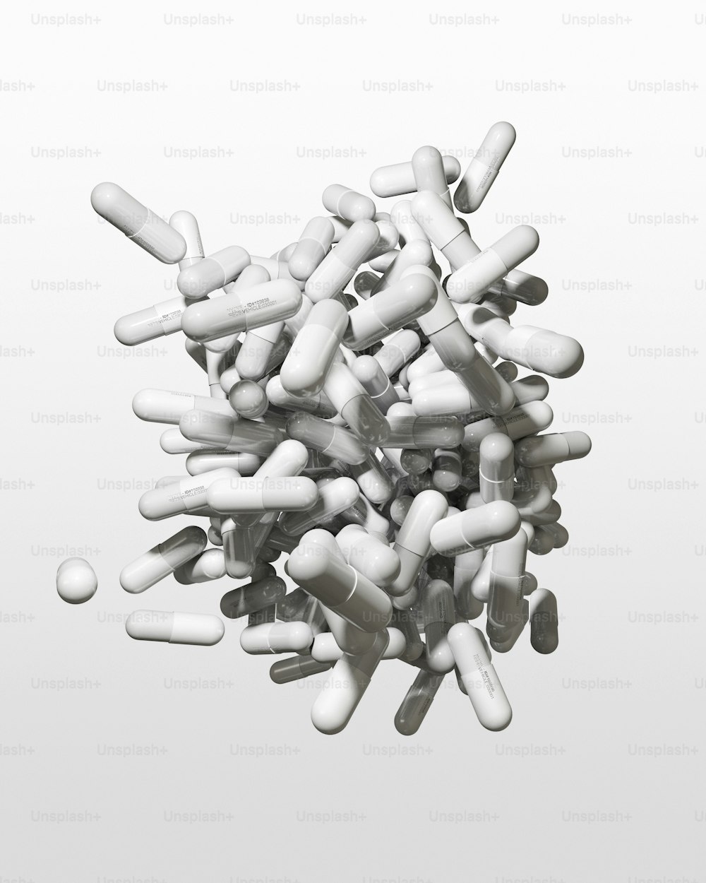 a pile of pills sitting on top of a white table