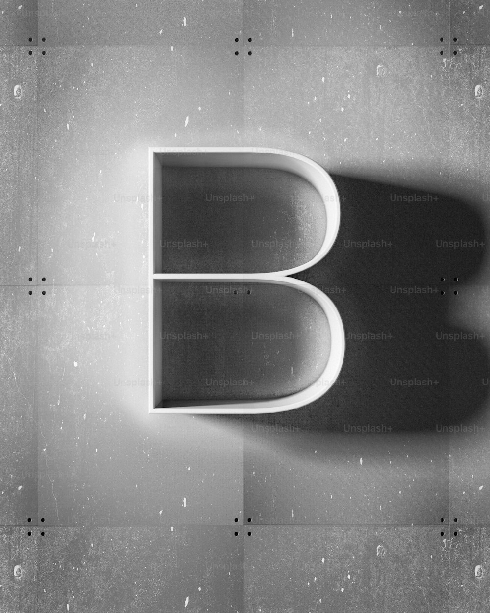 Una foto in bianco e nero della lettera B
