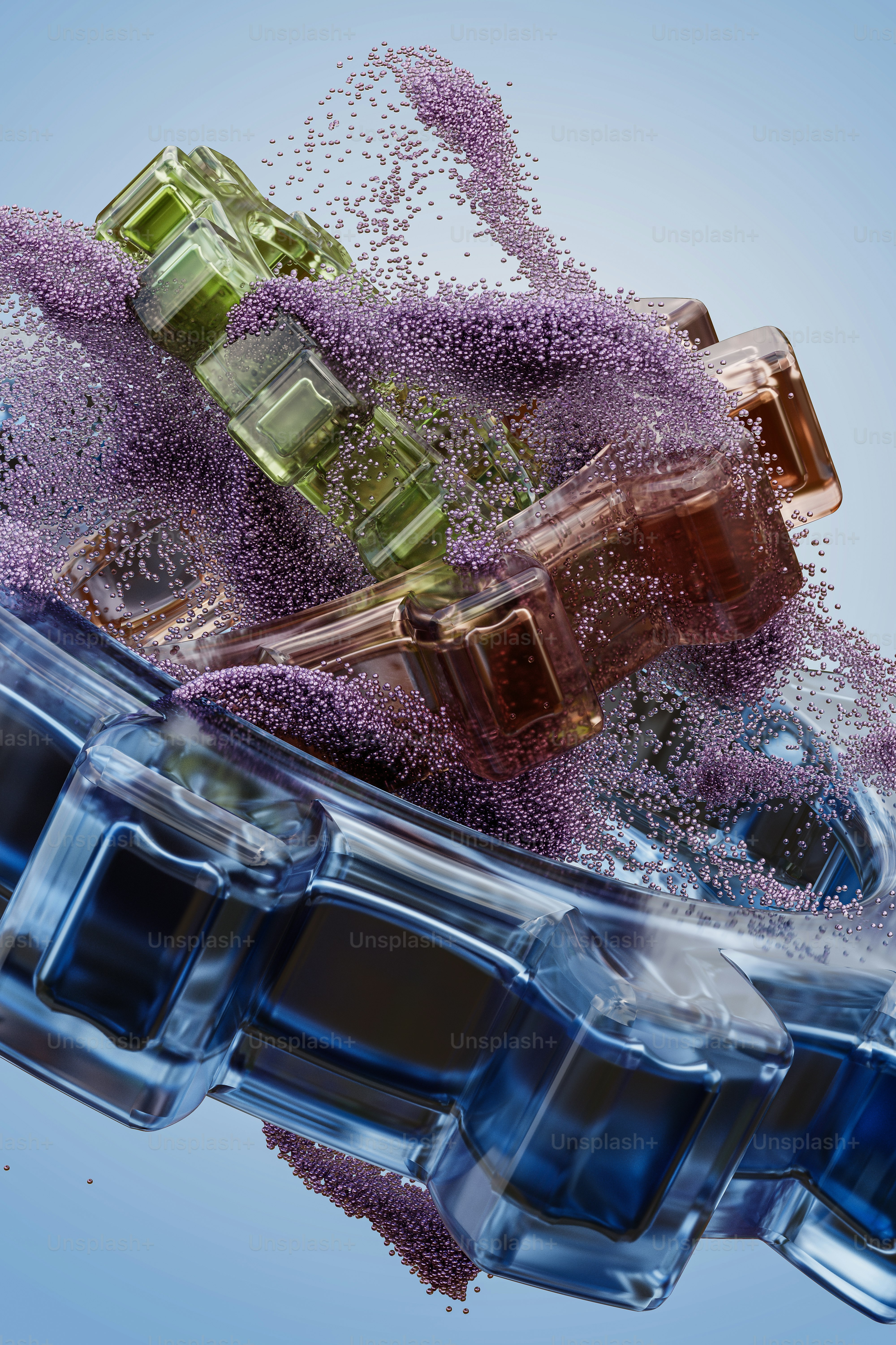 a pair of glasses filled with purple and green sprinkles