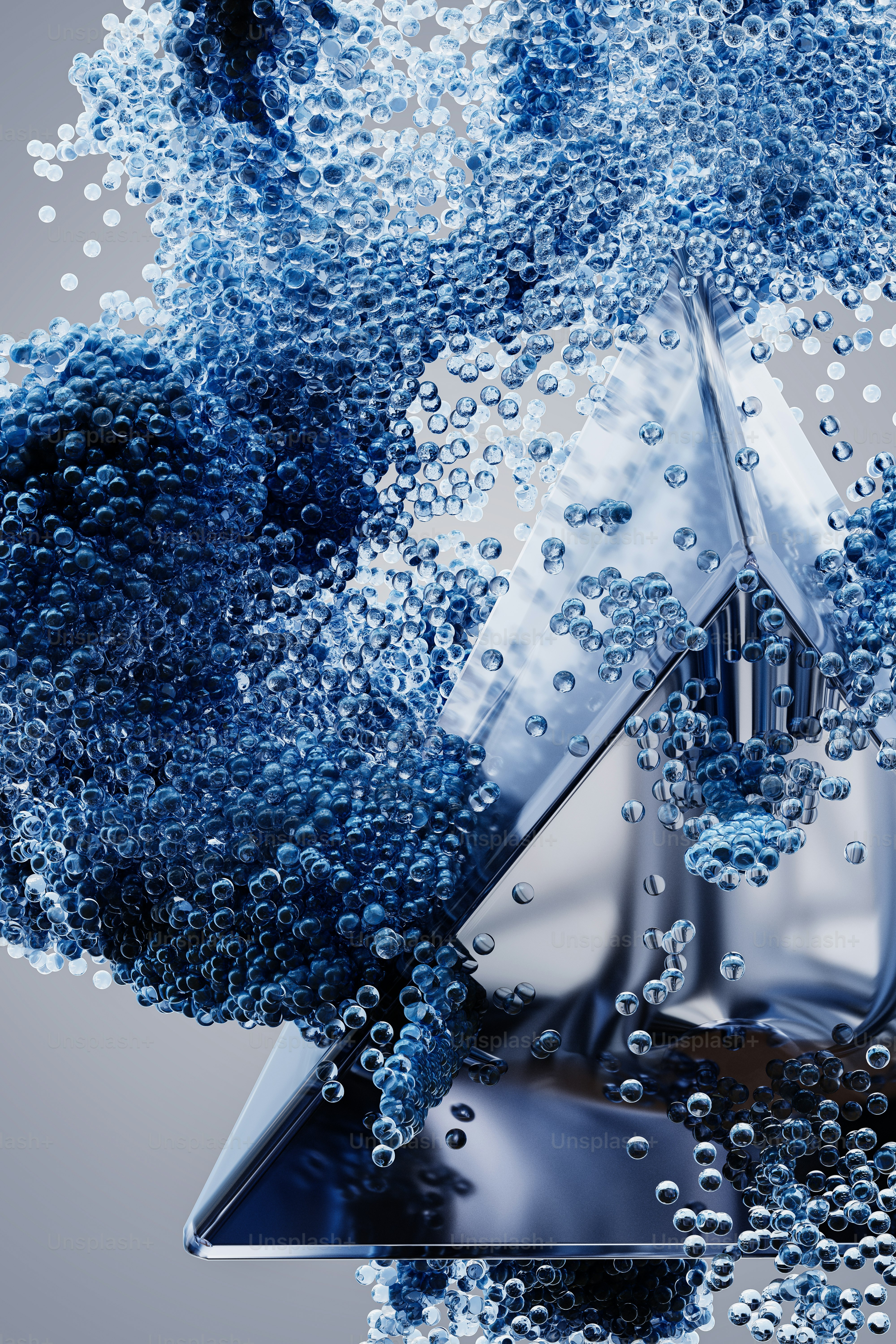 a close up of water bubbles and a triangle shaped object