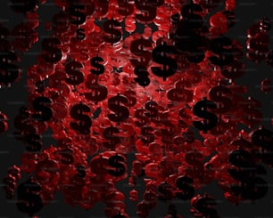 eine Reihe roter und schwarzer Knöpfe auf schwarzem Hintergrund