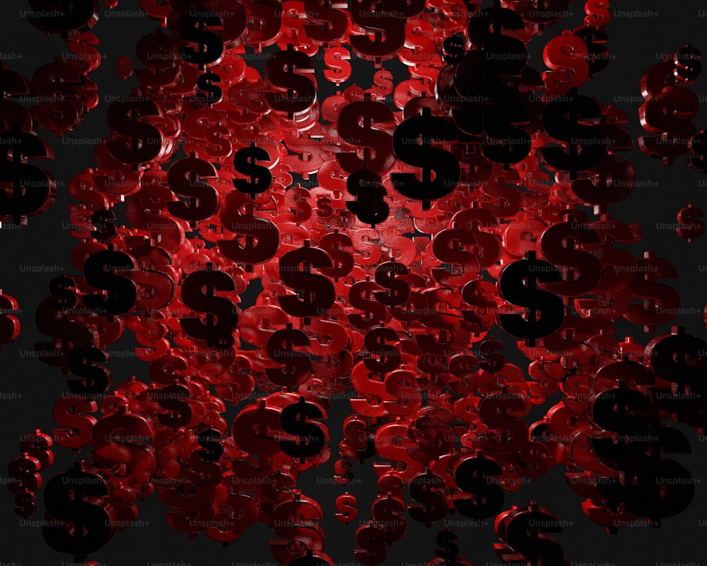 a bunch of red and black buttons on a black background