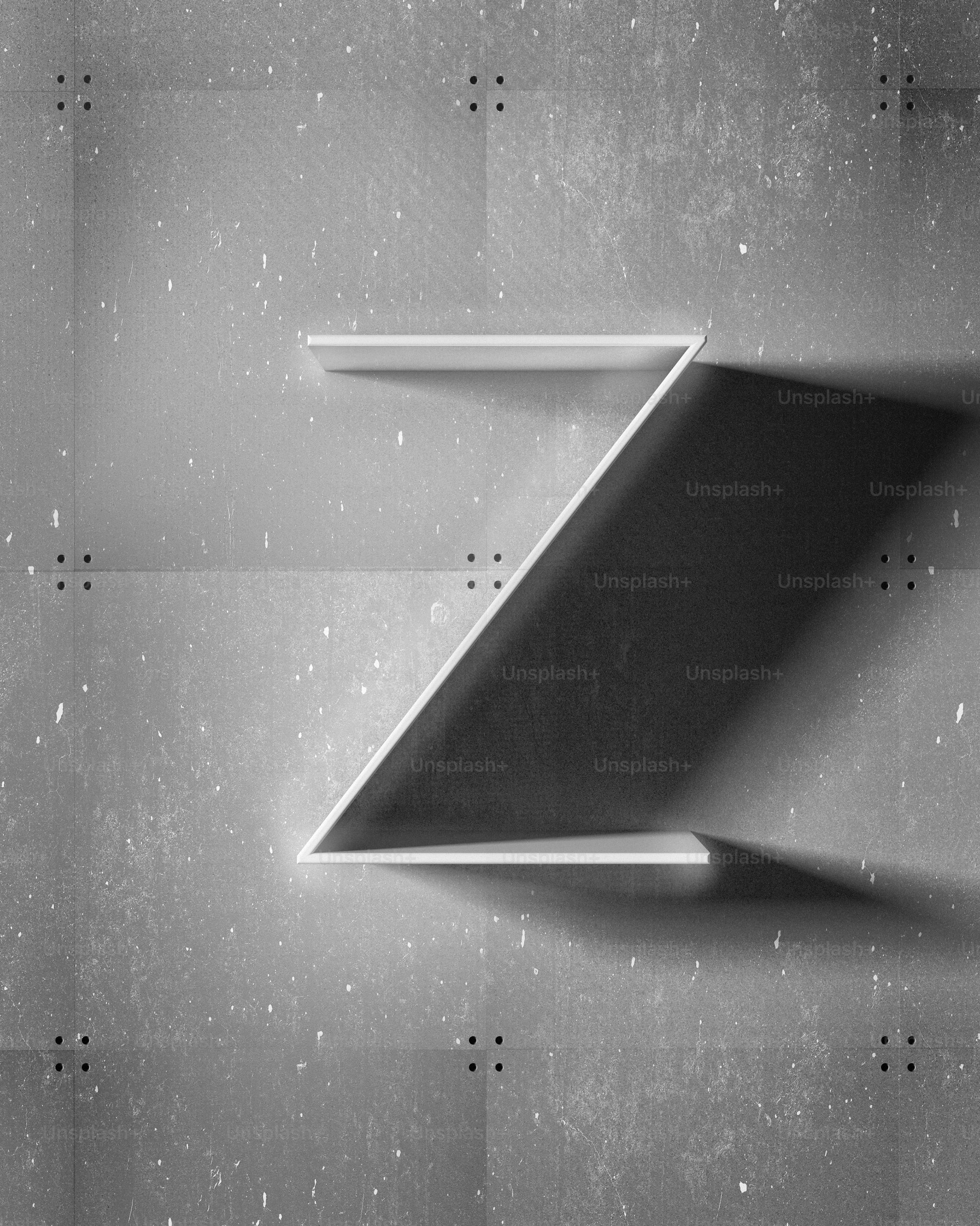 a black and white photo of a shelf on a wall