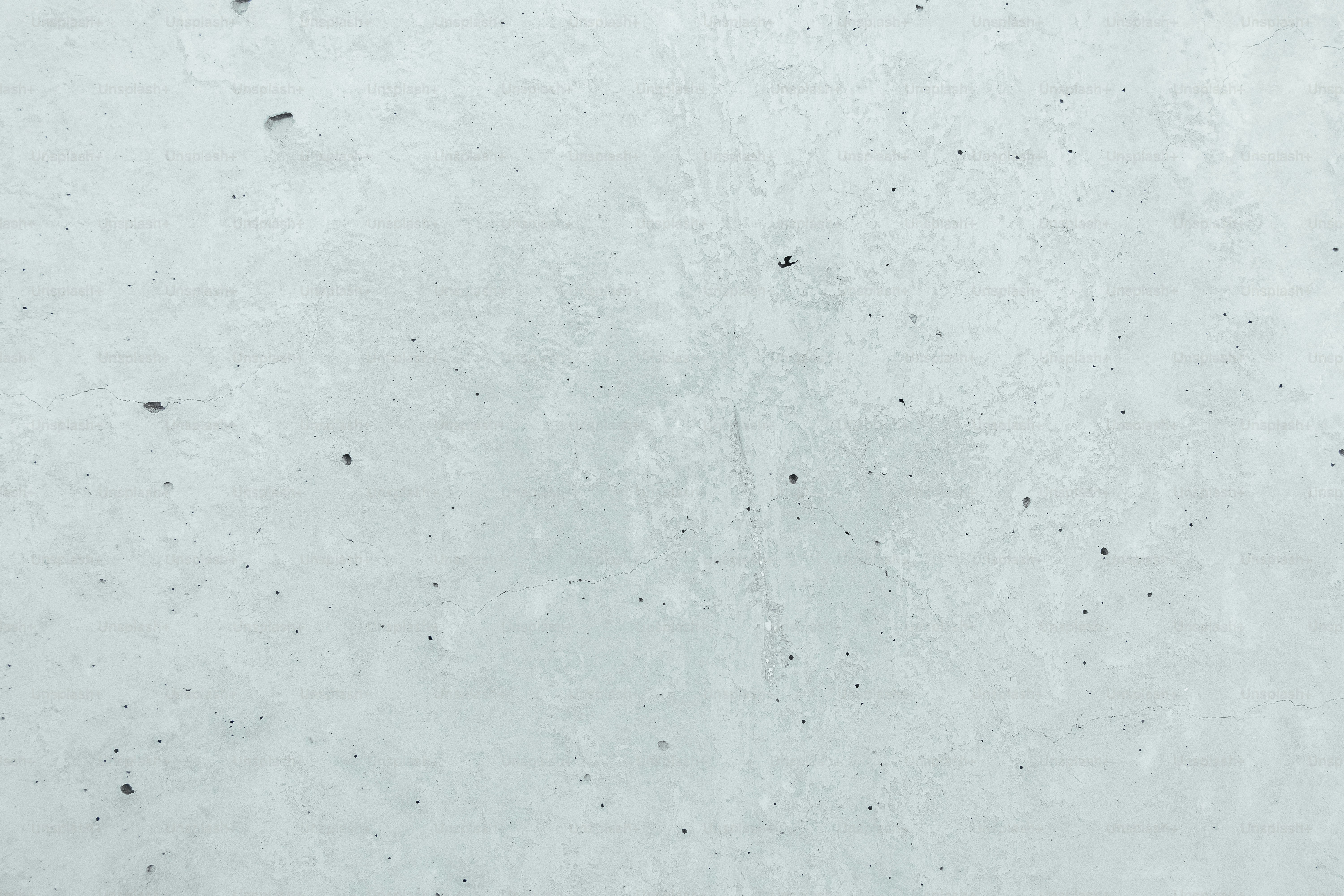 une photo en noir et blanc d’un mur blanc