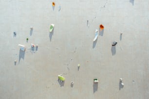 a group of different colored objects on a wall