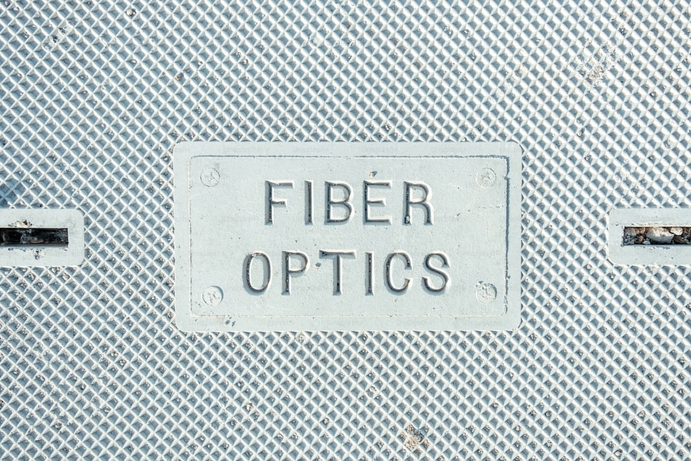 a close up of a metal object with a sign on it