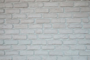 a close up of a white brick wall