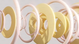 a group of yellow and pink circular objects