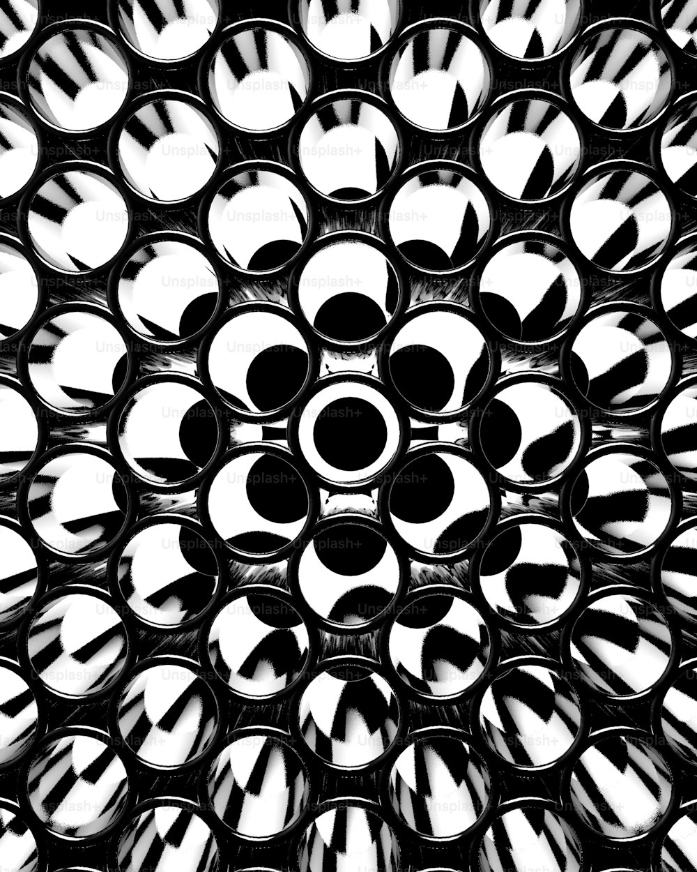 Ein Schwarz-Weiß-Foto von einem Haufen Kreise