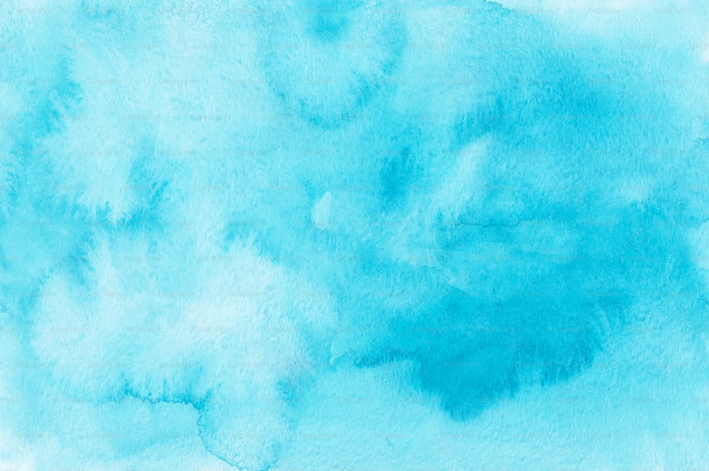 a blue watercolor background with a white background