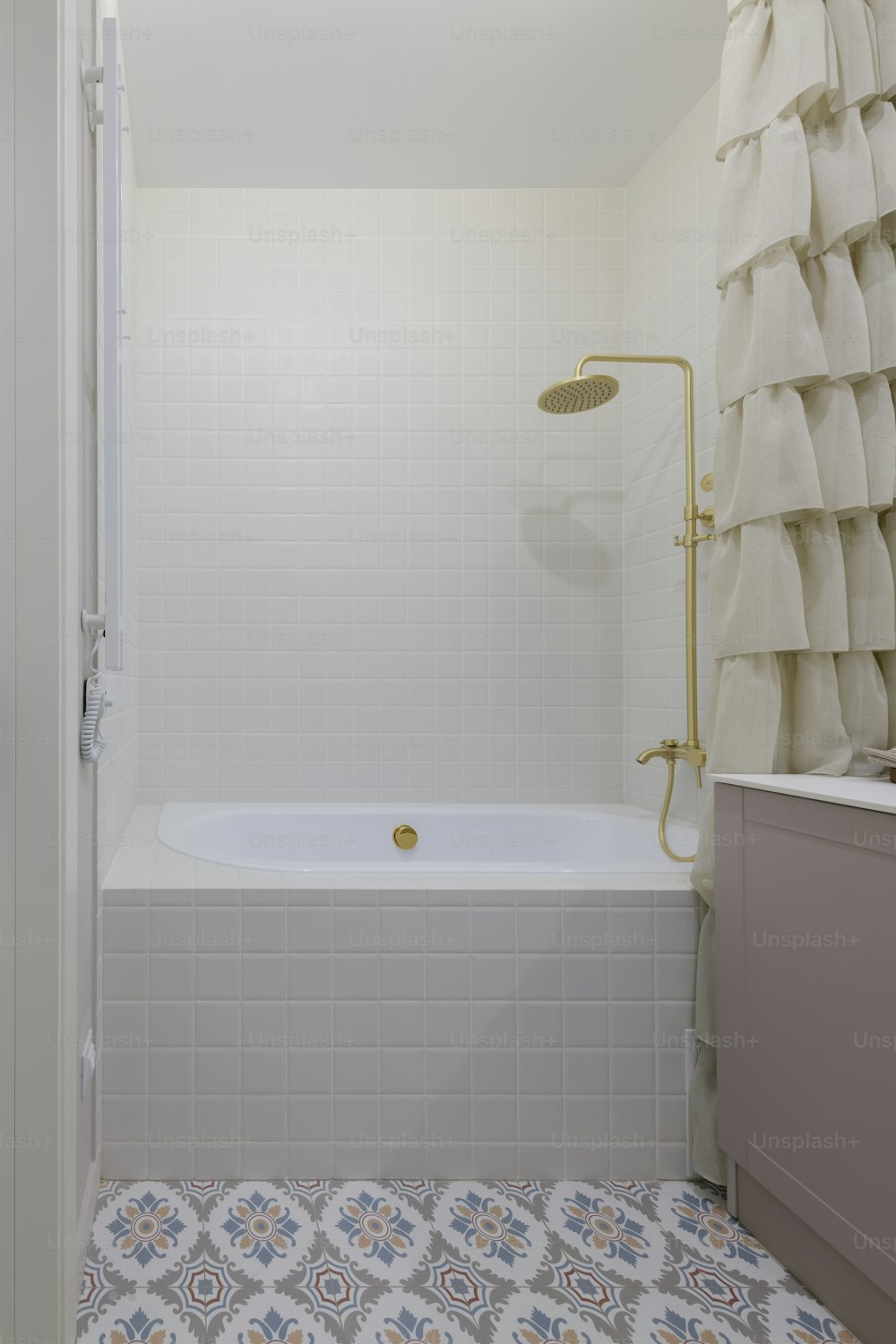 a bathroom with a bathtub and a shower curtain