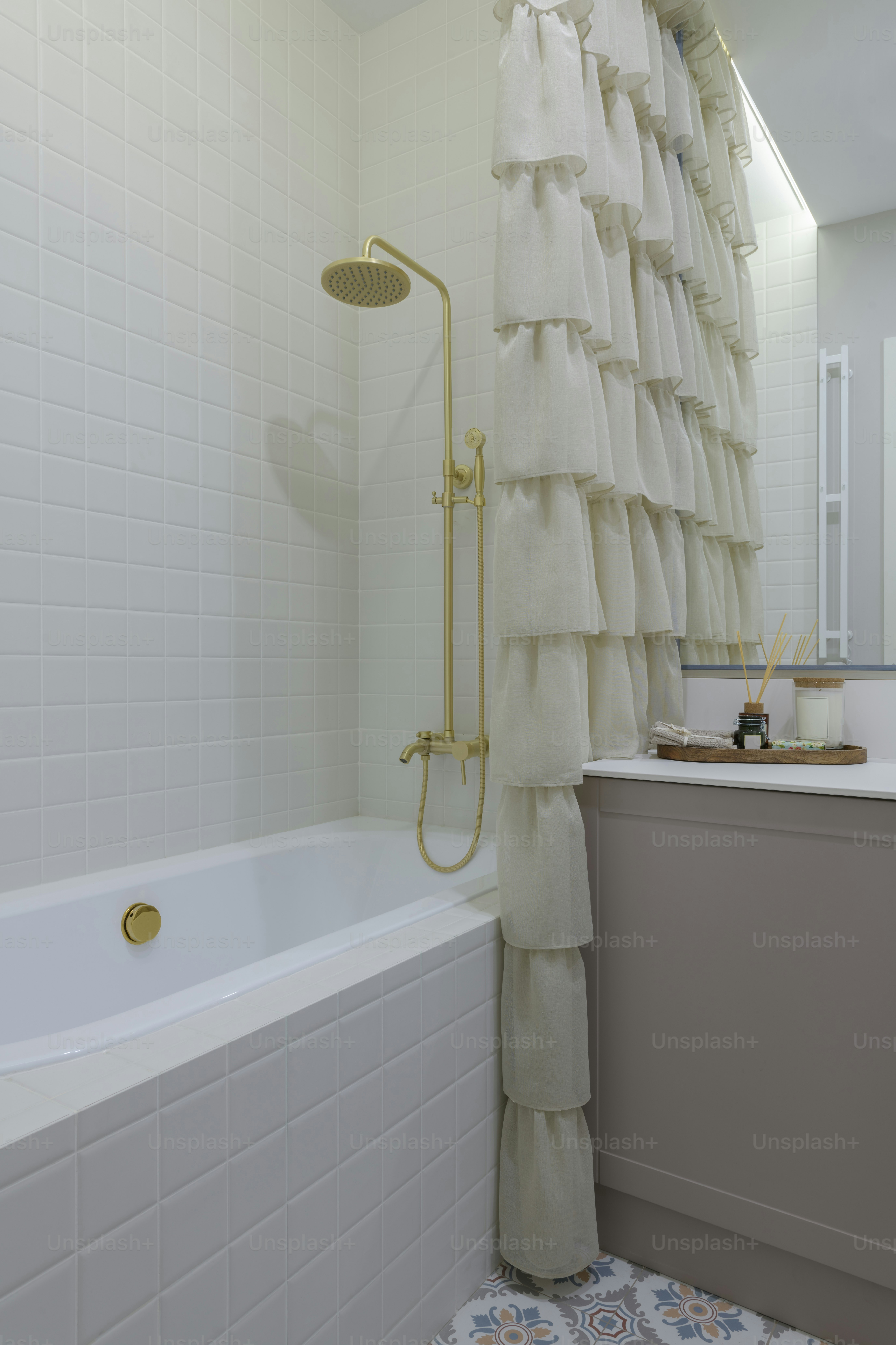 a bathroom with a shower and a bath tub