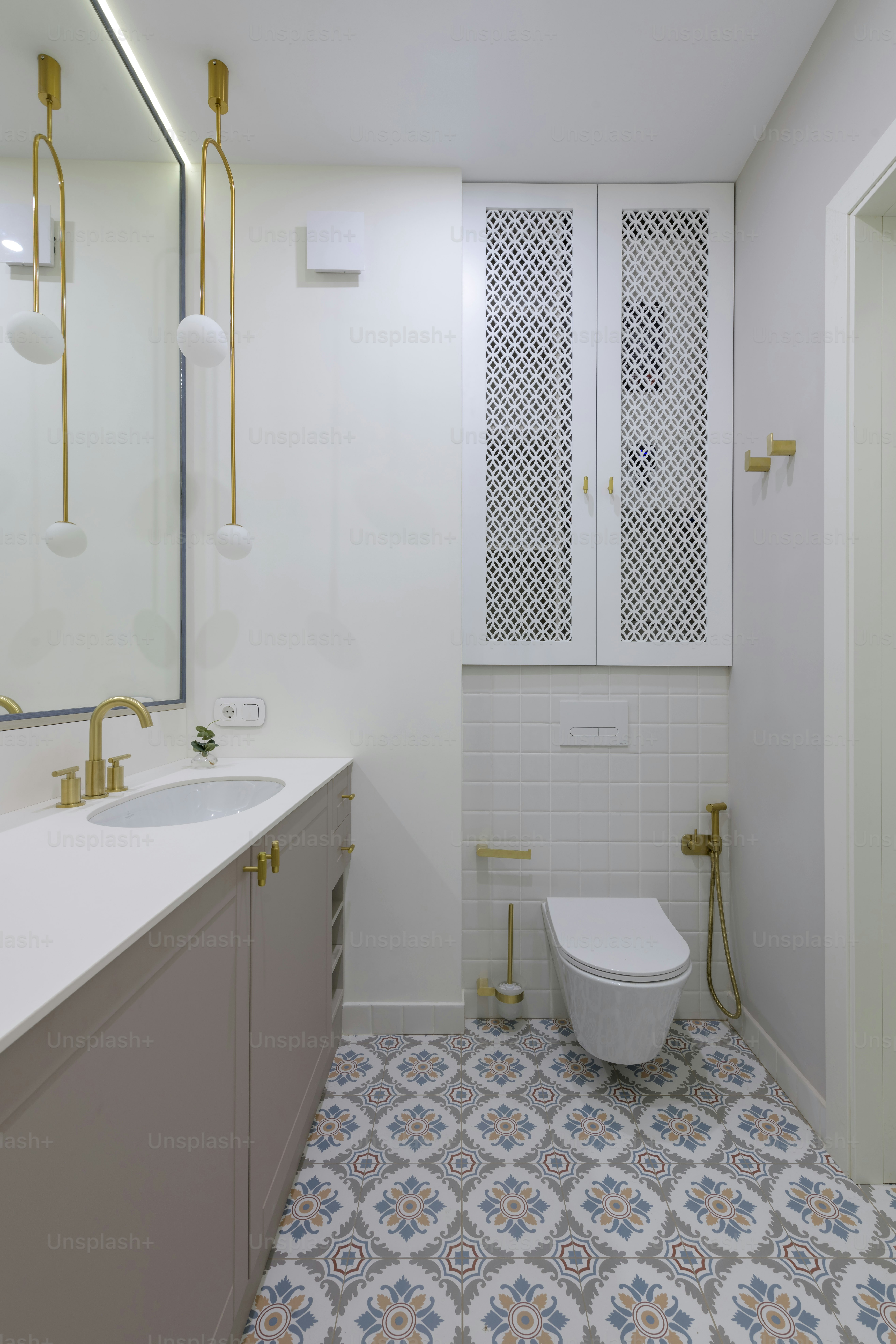 a bathroom with a toilet and a sink