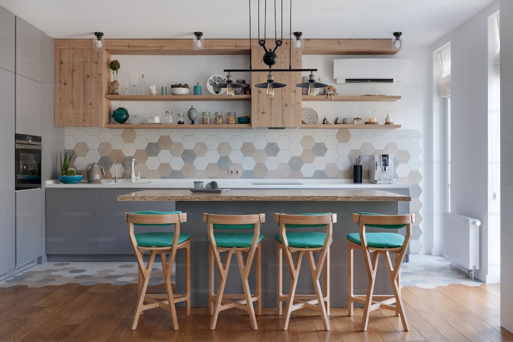 a kitchen with a table and four stools