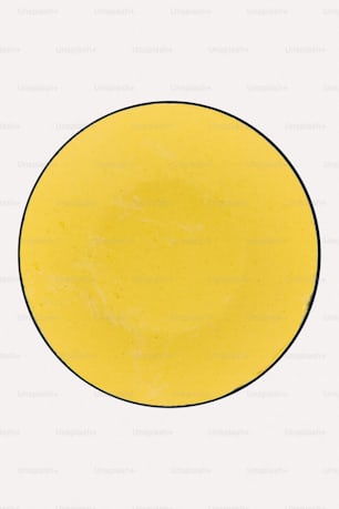 a yellow plate with a black border on a white background