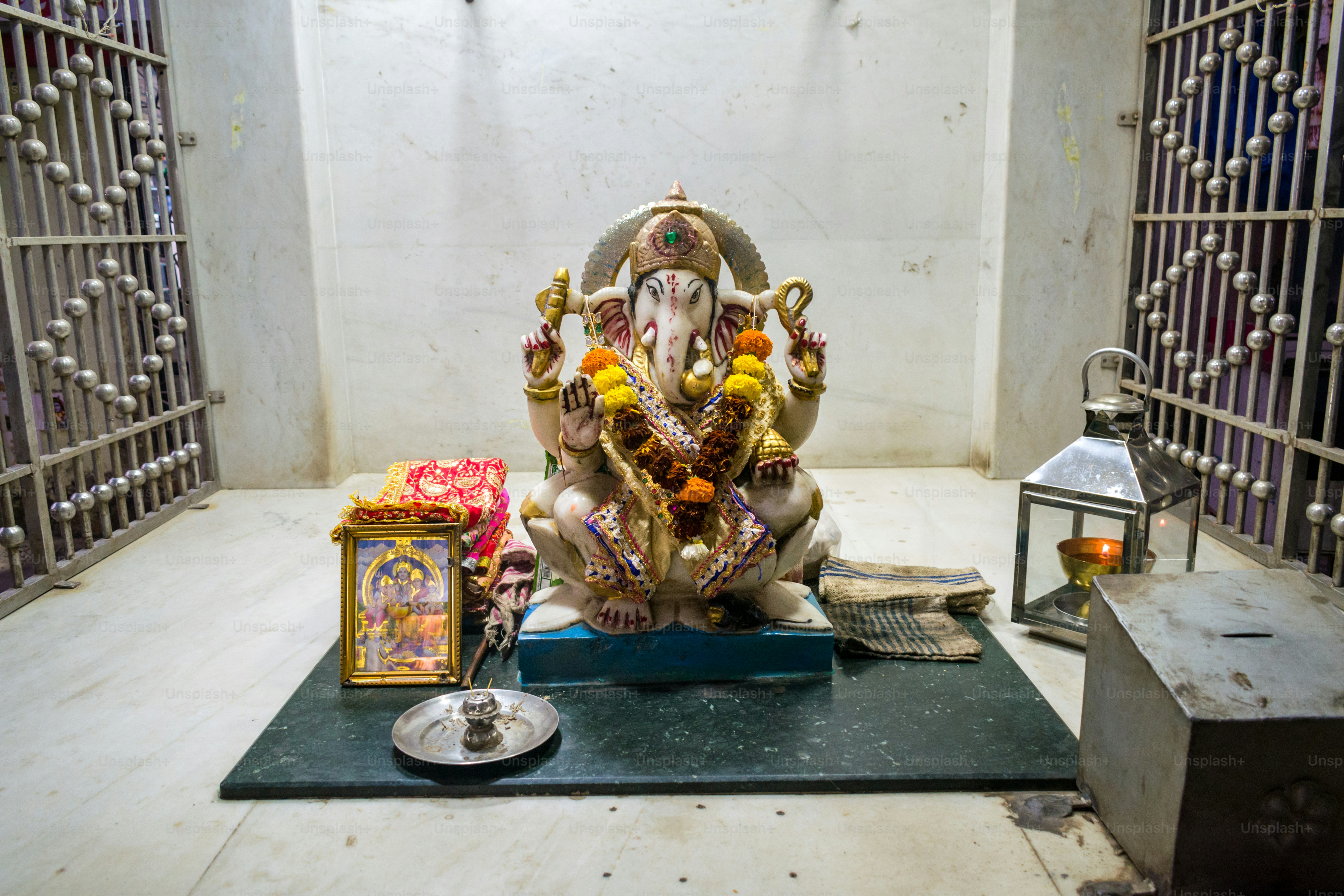 A beautiful idol of Lord Ganesha being worshipped at a Hindu Temple for the festival of Ganesh Jayanti or Maghi Ganesh Utsav in Mumbai, India