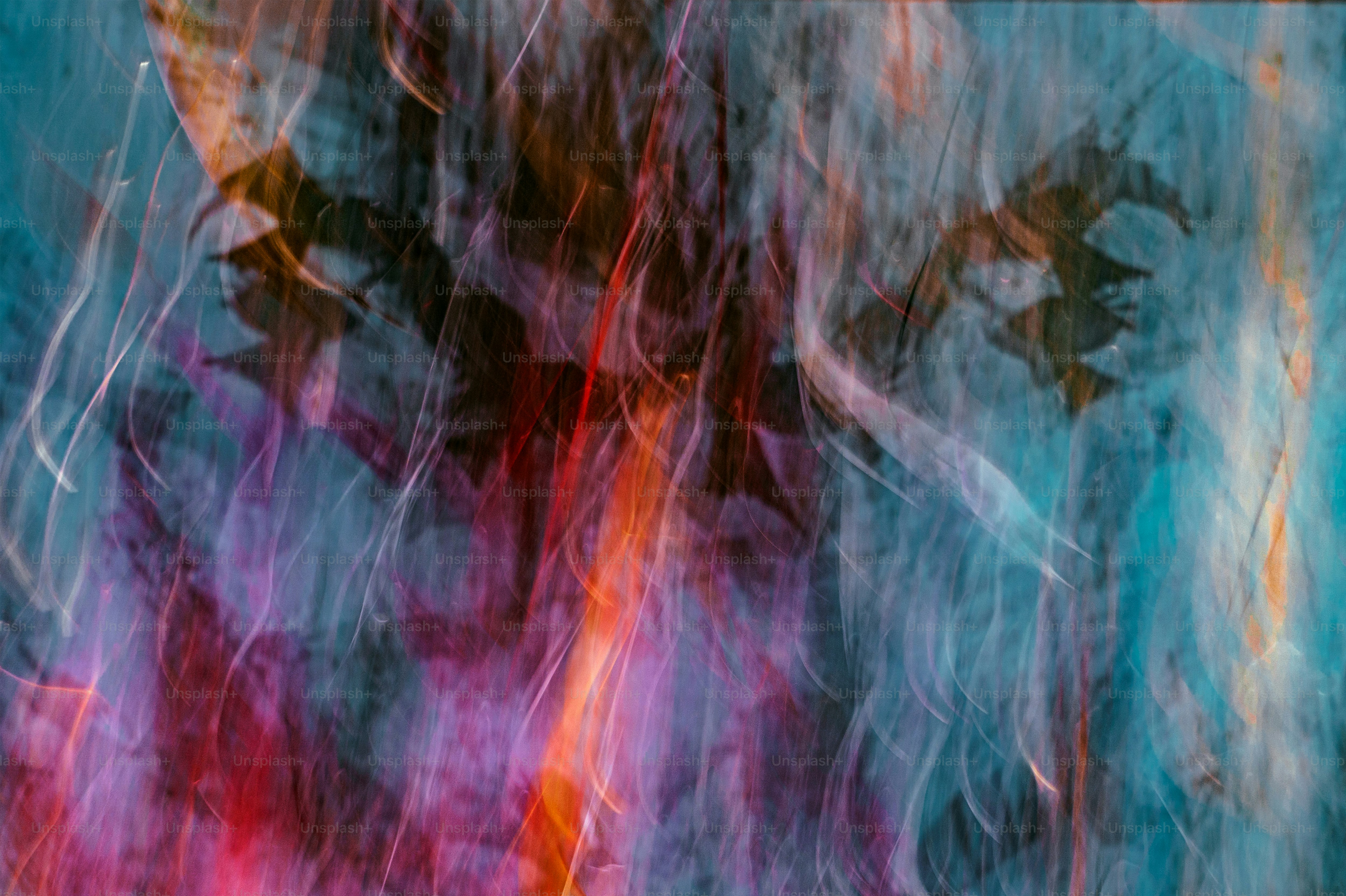 a blurry image of a man with a hat